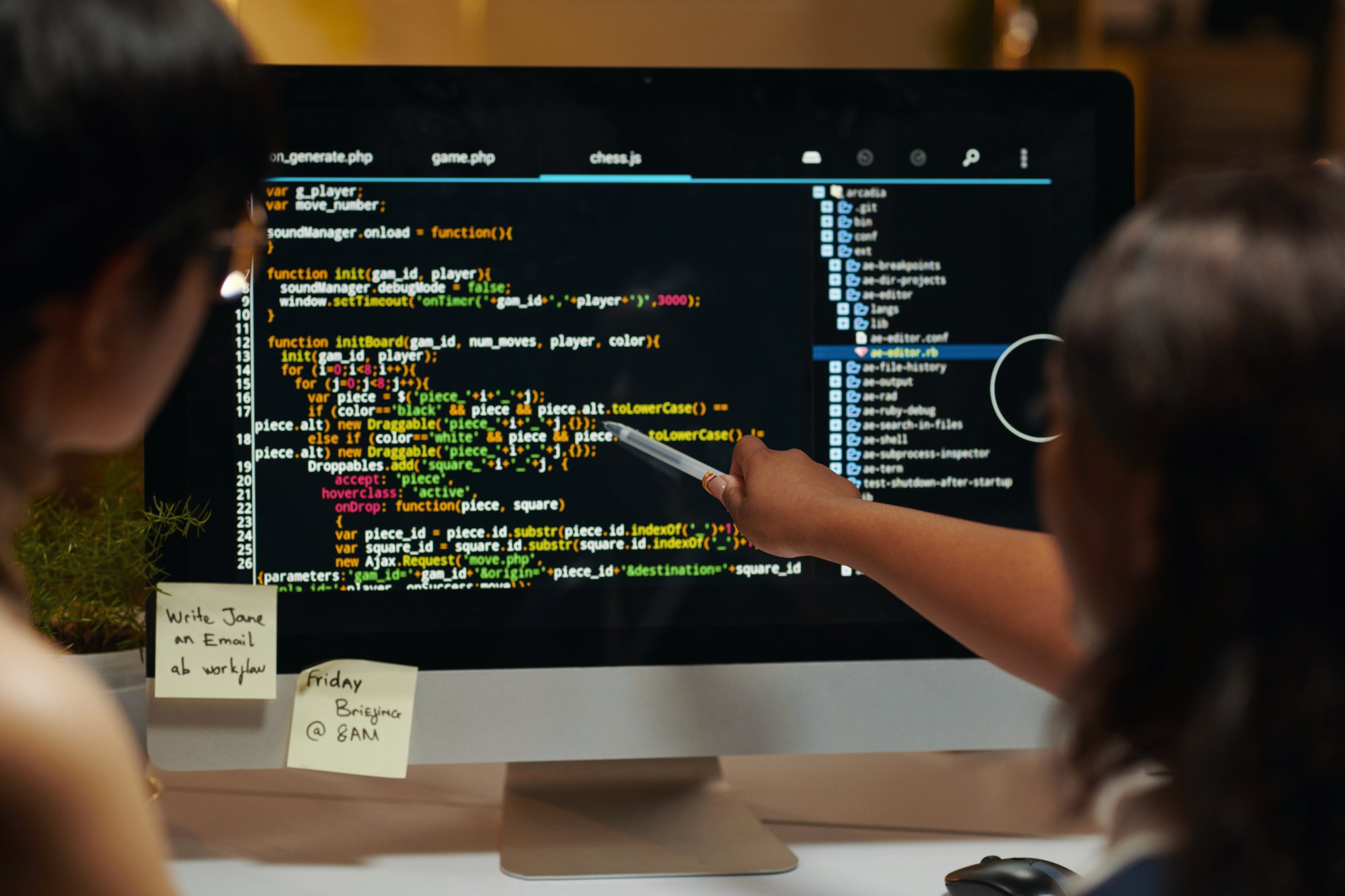 developers-pointing-at-programming-code-2025-01-29-07-48-52-utc